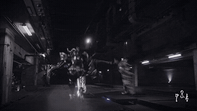 Black And White Photo Of Two Robots Fighting Number 626 GIF