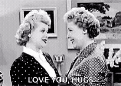 Black And White Photo Of Two Women Hugging Saying Love You Hugs GIF