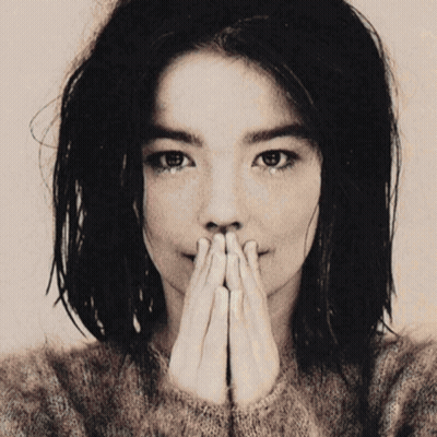 Black And White Photo Of Woman Covering Mouth GIF