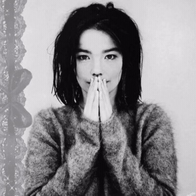 Black And White Photo Of Woman Covering Mouth GIF