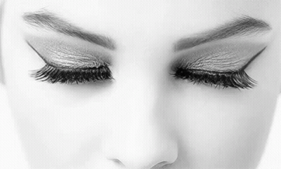 Black And White Photo Of Woman Eyes With Long Eyelashes GIF