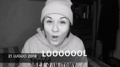 Black And White Photo Of Woman In Beanie And Grey 'S Anatomy Hoodie GIF