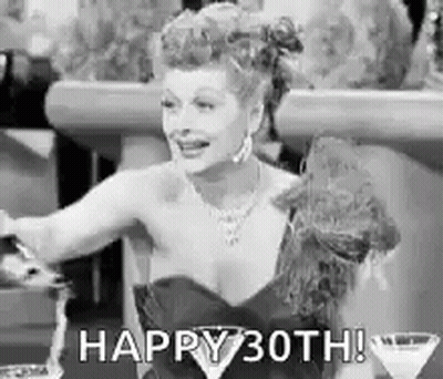 Black And White Photo Of Woman In Dress Holding Martini Saying Happy 30Th GIF