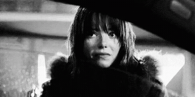 Black And White Photo Of Woman In Fur Coat And Fur Hood GIF