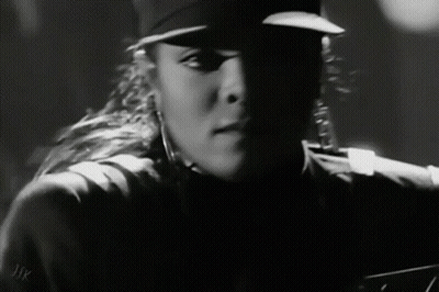 Black and White Photo of Woman in Hat