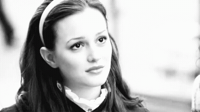 Black And White Photo Of Woman In Headband GIF