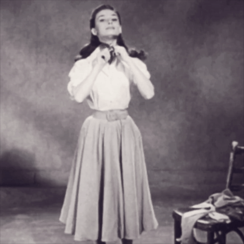 Black And White Photo Of Woman In Long Skirt GIF