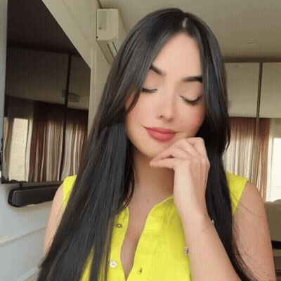 Black And White Photo Of Woman In Store GIF