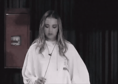 Black And White Photo Of Woman In Sweatshirt Saying Freedom GIF