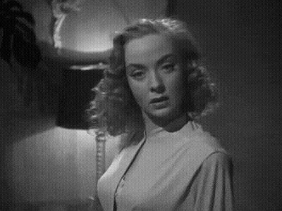 Black And White Photo Of Woman In White Dress GIF