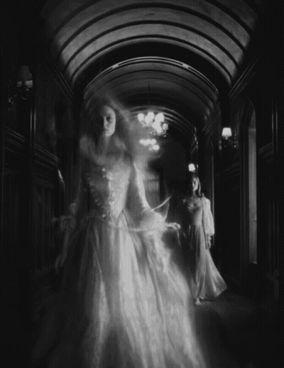 Black And White Photo Of Woman In White Dress GIF