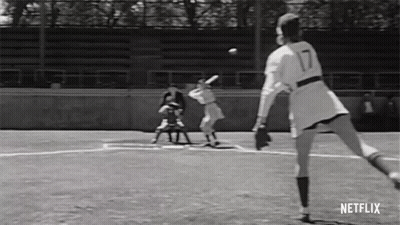 Black And White Photo Of Woman Playing Softball GIF