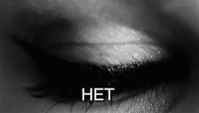 Black And White Photo Of Woman's Eye Saying Het GIF