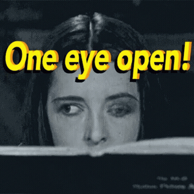 Black And White Photo Of Woman Saying One Eye Open GIF