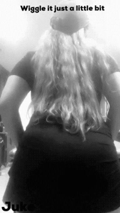 Black And White Photo Of Woman Saying Wiggle It Just A Little Bit GIF