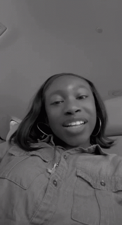 Black And White Photo Of Woman Smiling With Button GIF