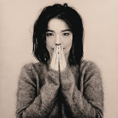 Black And White Photo Of Woman With Folded Hands GIF