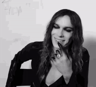 Black And White Photo Of Woman With Long Hair And Ring GIF