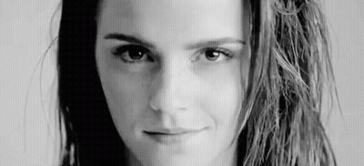 Black And White Photo Of Woman With Long Hair Smiling GIF