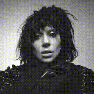 Black And White Photo Of Woman With Messy Hair GIF