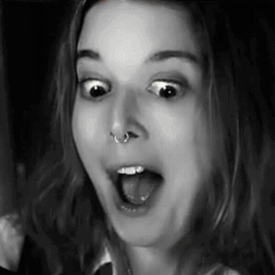 Black And White Photo Of Woman With Mouth Open GIF