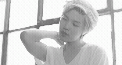 Black And White Photo Of Young Man Hand On Neck GIF