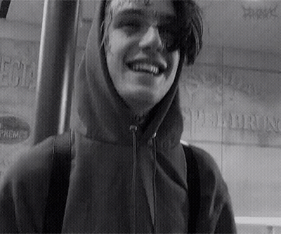 Black And White Photo Of Young Man In Hoodie GIF