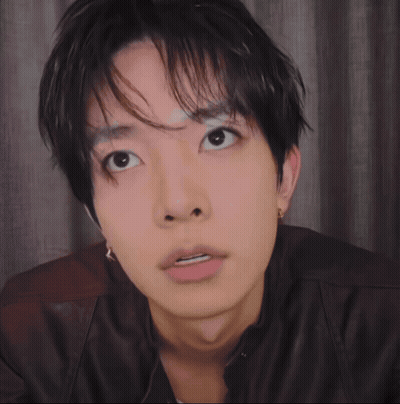 Black And White Photo Of Young Man With Eyes Closed GIF