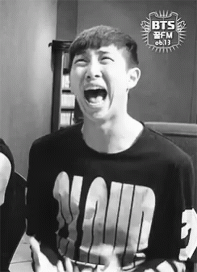 Black And White Photo Of Young Man With Mouth Open GIF