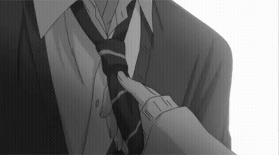 Black And White Photo Person Adjusting Tie GIF