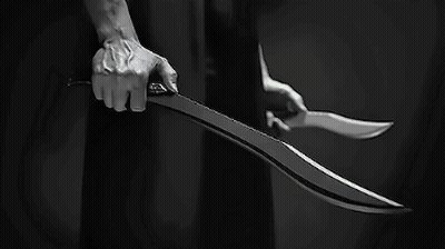 Black And White Photo Person Holding Large Sword GIF