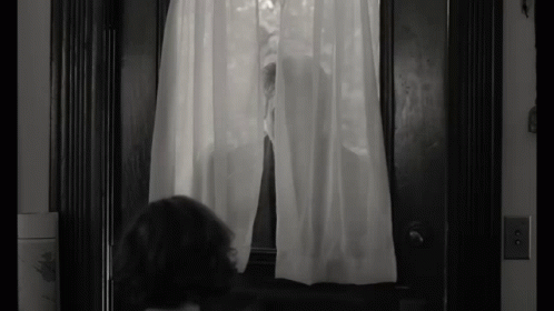 Black And White Photo Person Looking Out Window GIF