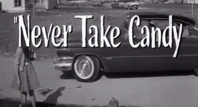 Black And White Photo Saying Never Take Candy GIF