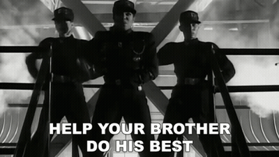 Black and White Photo Three Men Help Your Brother Do His Best