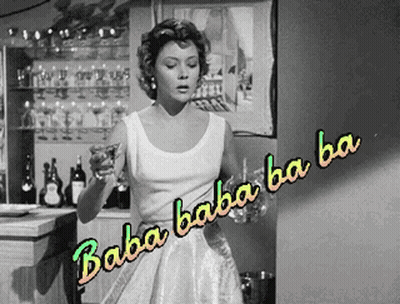 Black And White Photo Woman Holding Glass Saying Baba Baba Ba Ba GIF