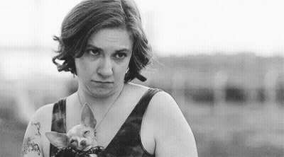 Black And White Photo Woman Holding Small Dog GIF