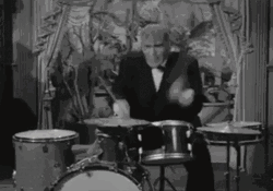 Black And White Playing Drum GIF