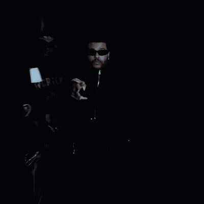 Black And White Police Officer Talking Next To Car GIF
