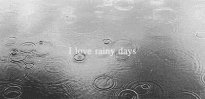 Black And White Raindrops Saying I Love Rainy Days GIF