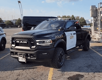 Black And White Ram Truck With Police GIF