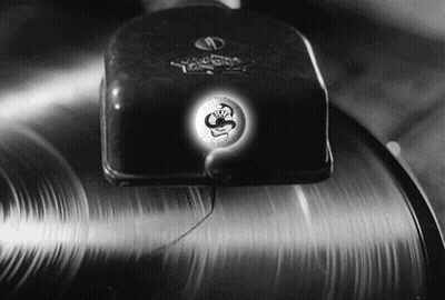 Black And White Record Player With Cobra Symbol GIF