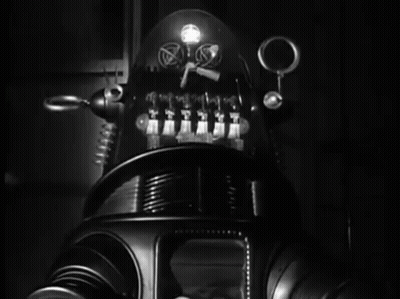 Black And White Robot With Light On Head GIF