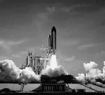 Black And White Rocket Launching Into Space GIF