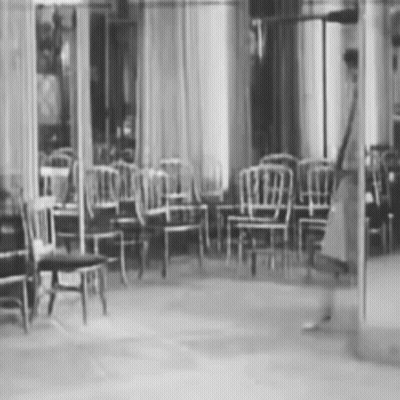 Black And White Row Of Chairs GIF