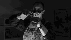 Black And White Scientist Mixing Chemicals GIF