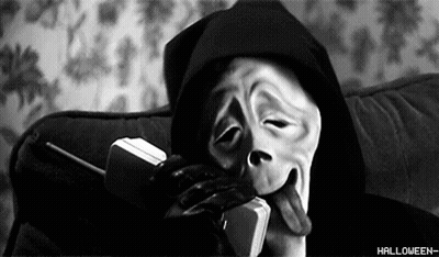Black And White Scream Mask Person Talking On Cell Phone GIF