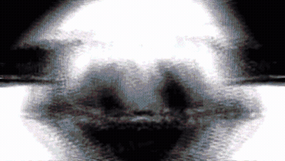Black And White Skull With Light Behind GIF