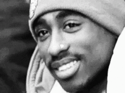 Black and White Smiling Man in Beanie