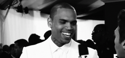 Black And White Smiling Man With F On Shirt GIF