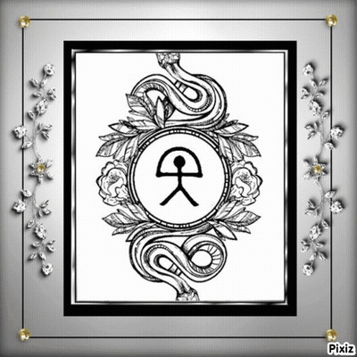 Black And White Snake Surrounded By Flowers And Leaves GIF